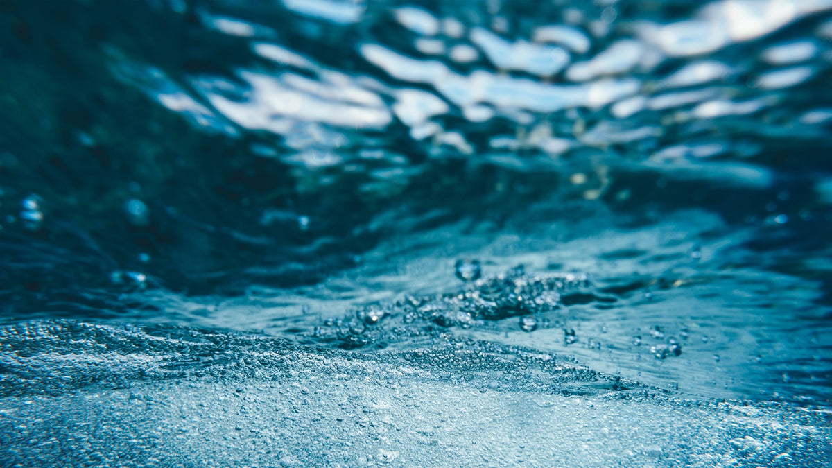 Wavy water with light refraction.