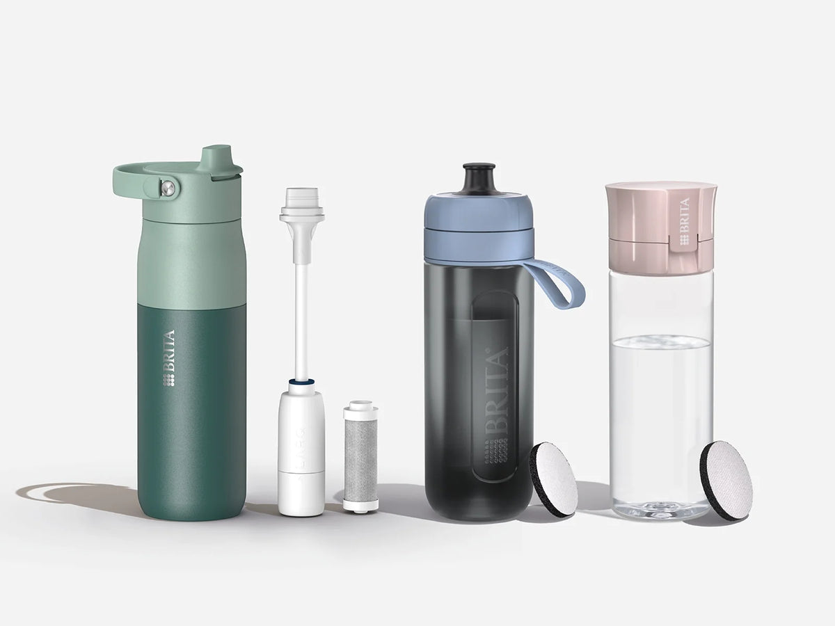 Three BRITA water filter bottles with filters on a white background.