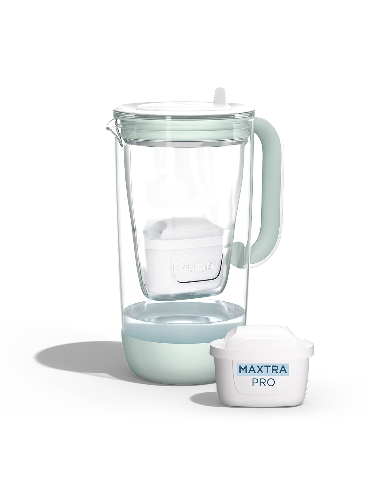 A water filter glass jug in green  on a white background