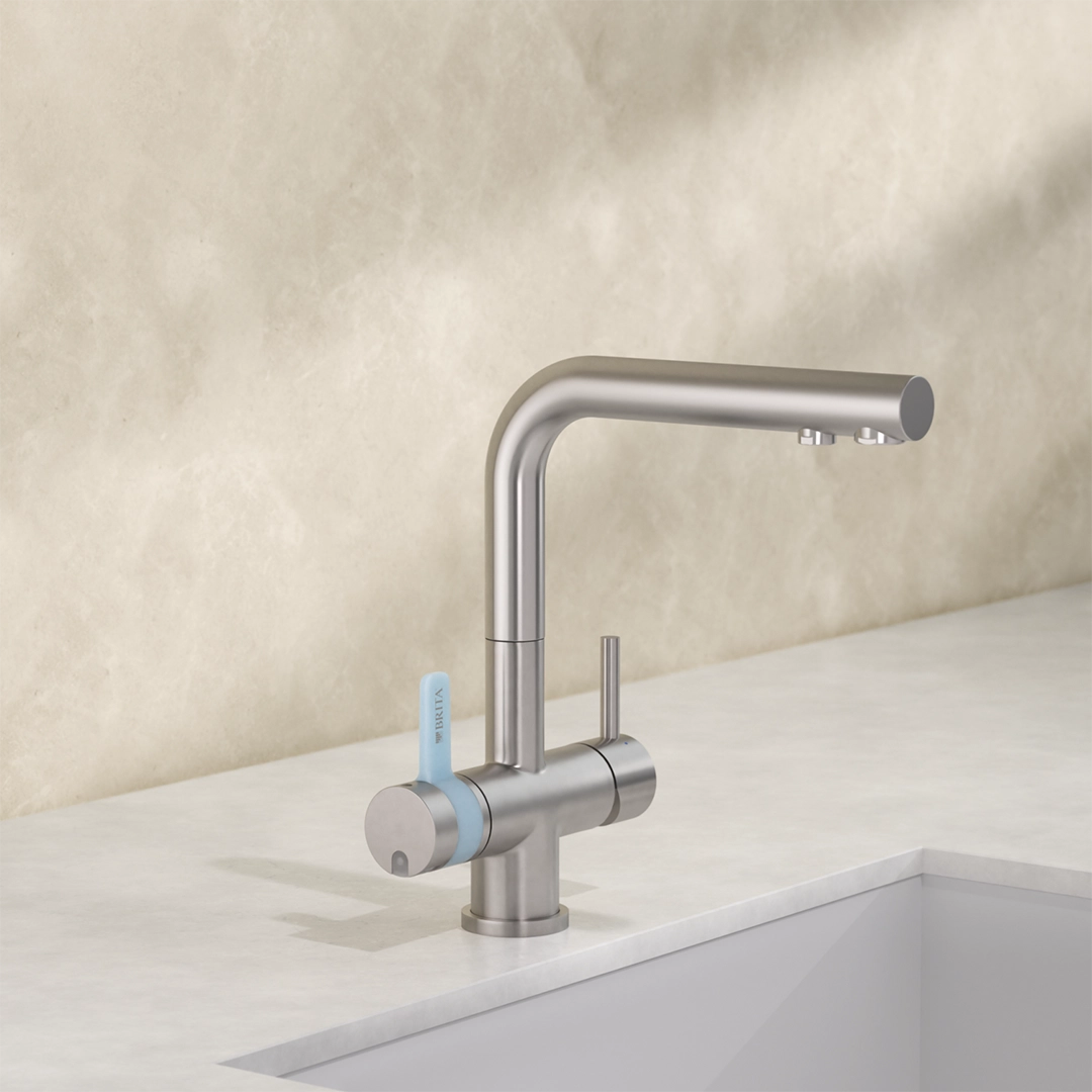 Robinet à 3 voies de forme rectangulaire sur fond beige